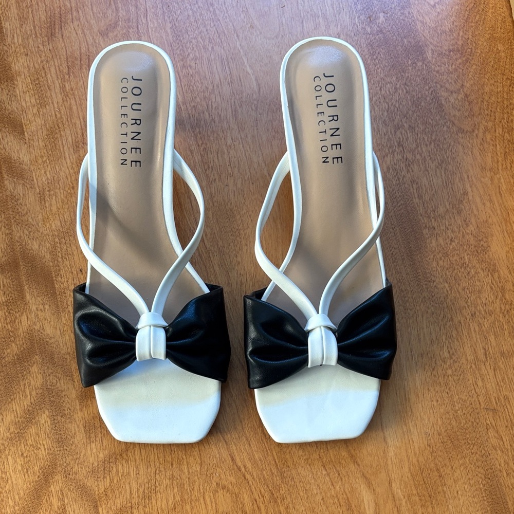 Journee Collection White Slide Mules with Black Bow Accent